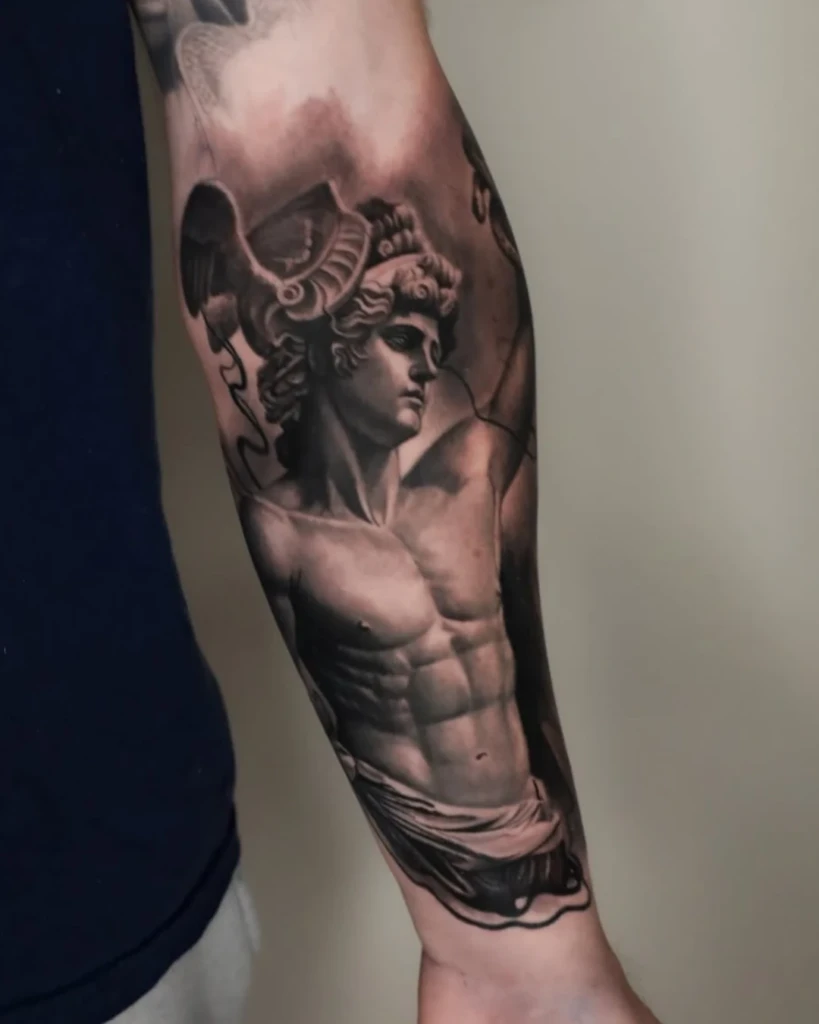 black and grey arm tattoo