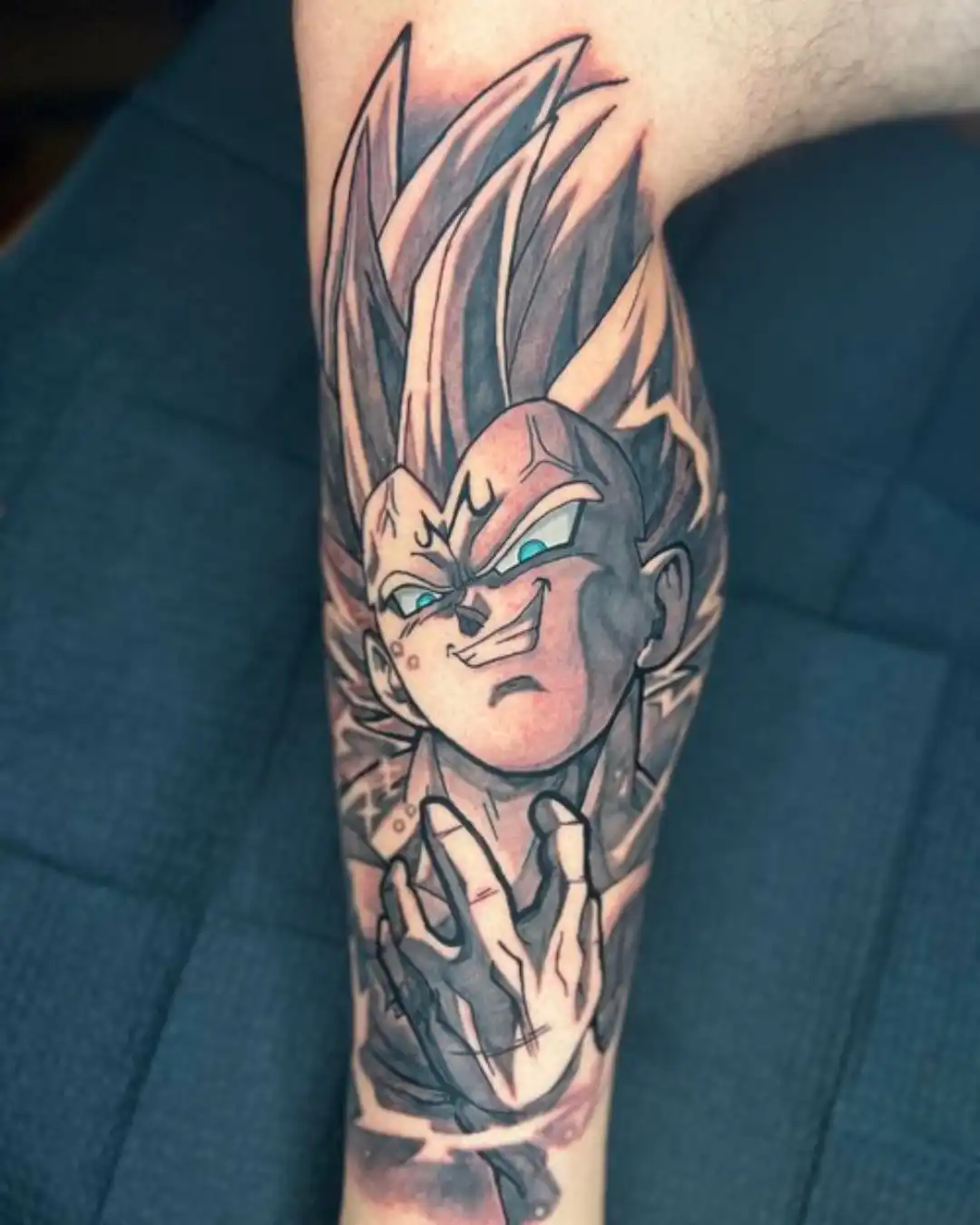 TJ Brown anime chest tattoos