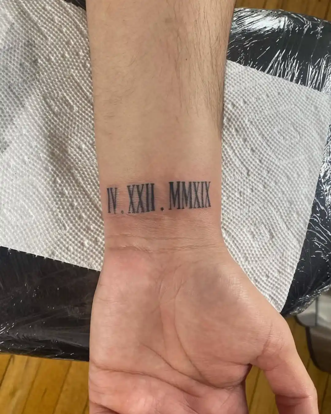 Tito Shadez skull fine line tattoo