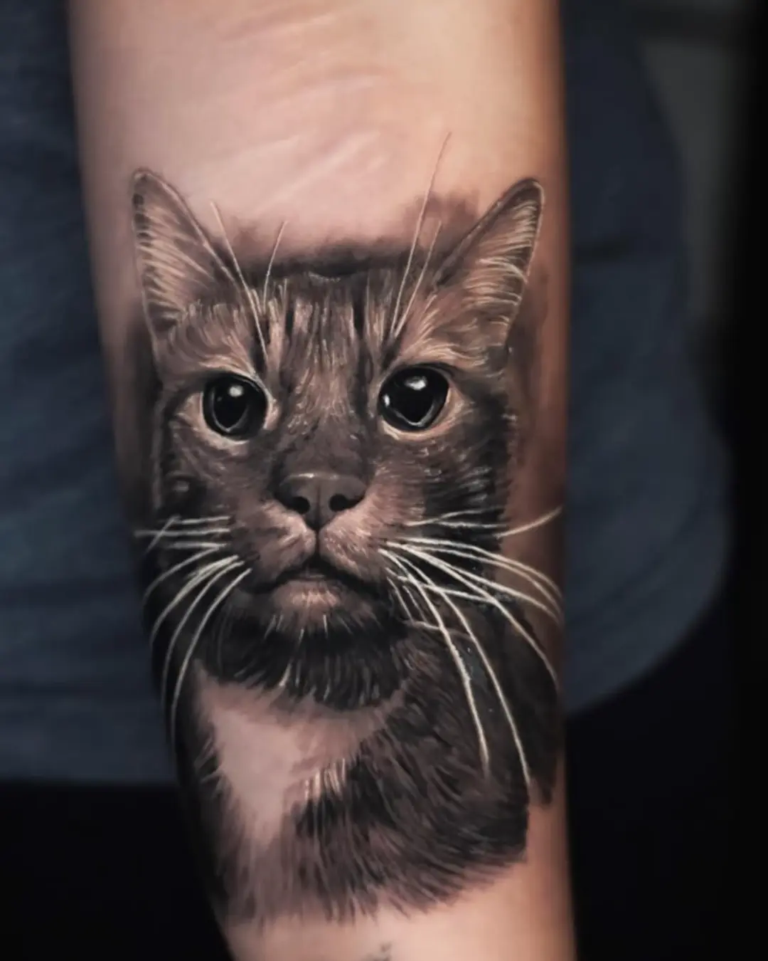black and grey arm tattoo