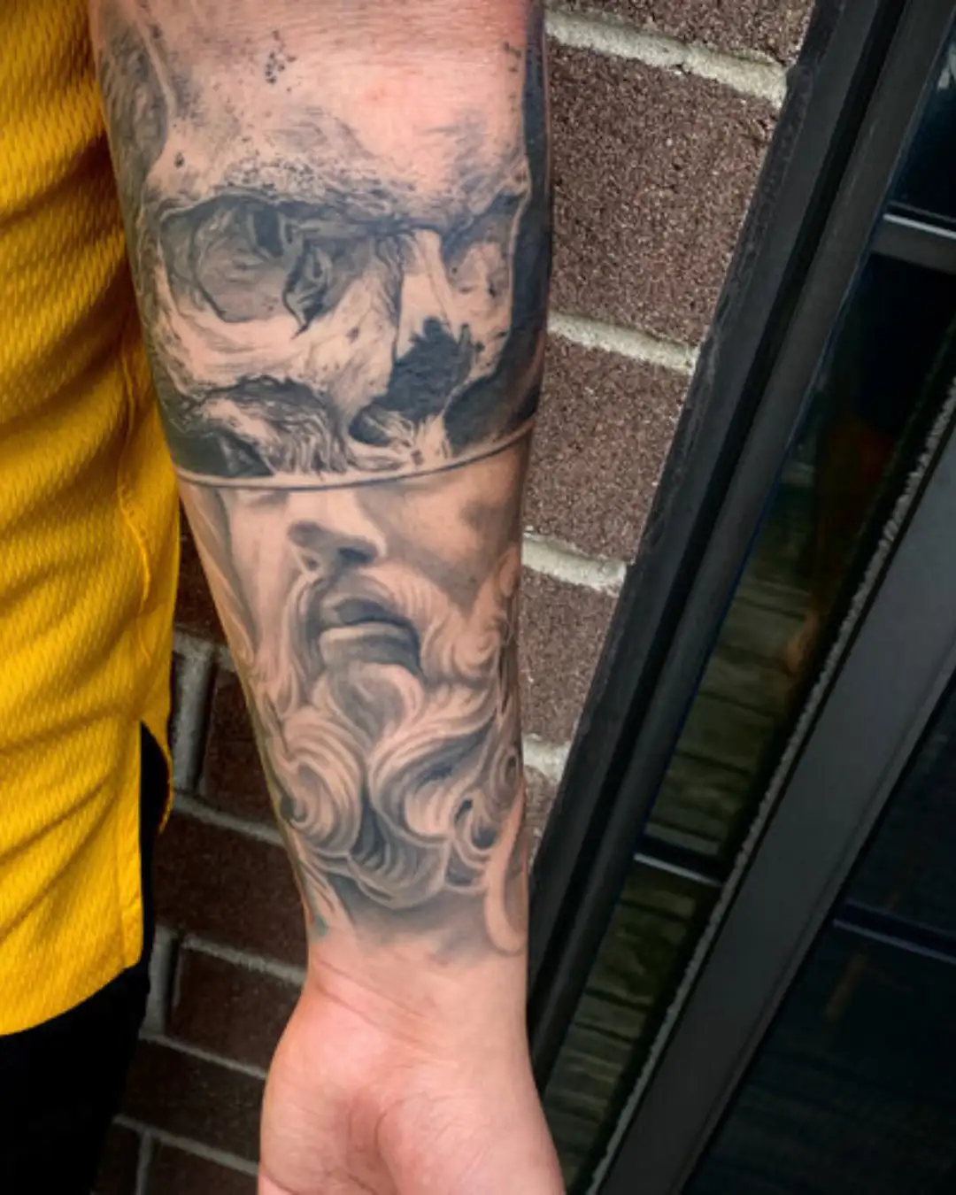 black and grey hand tattoo