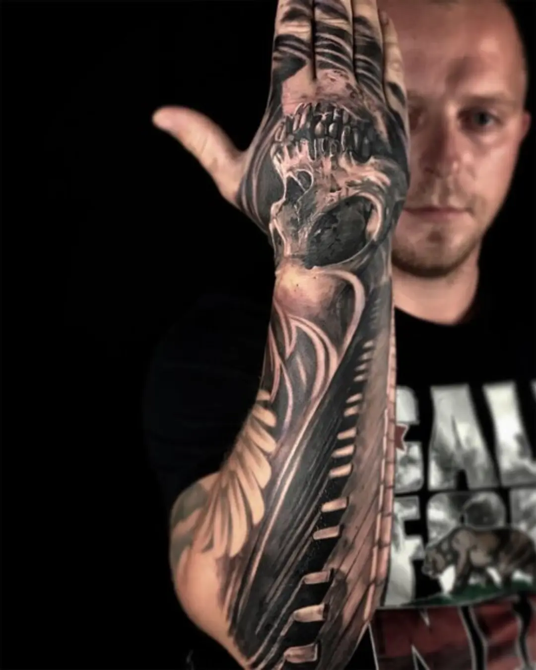 black and grey hand tattoo