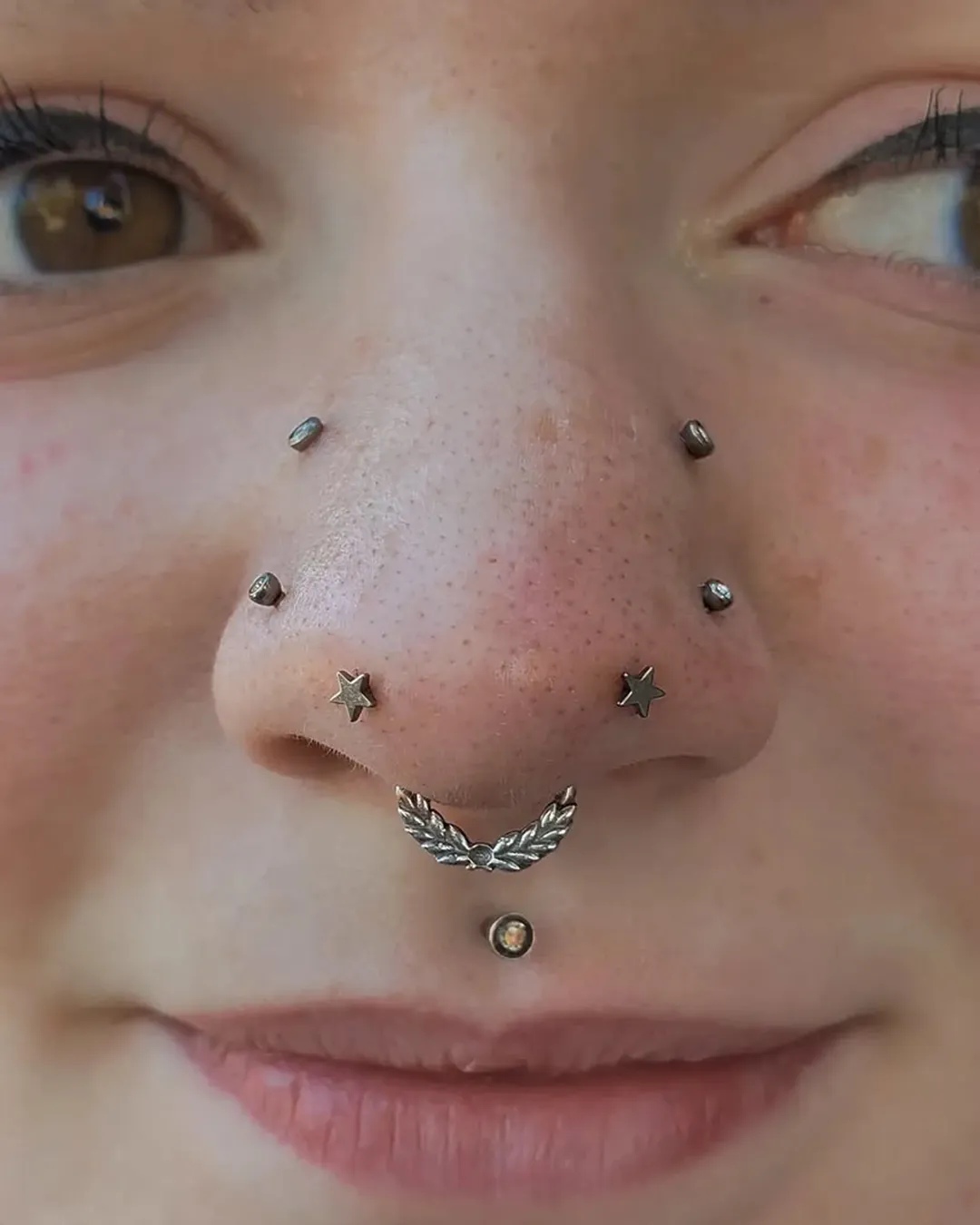 madeline kelso multiple nostril piercings titanium stars