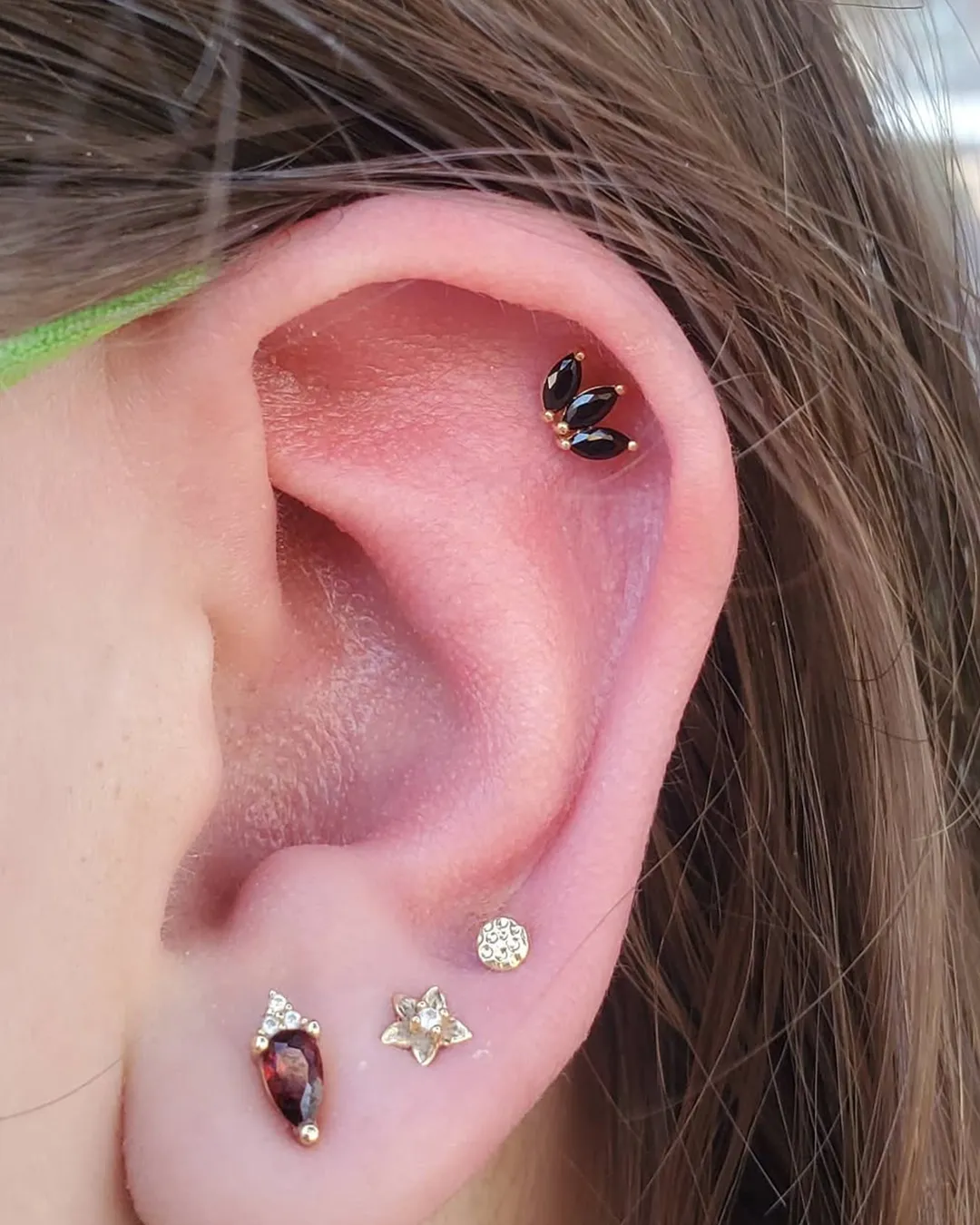 madeline kelso upper helix piercing black gemstones