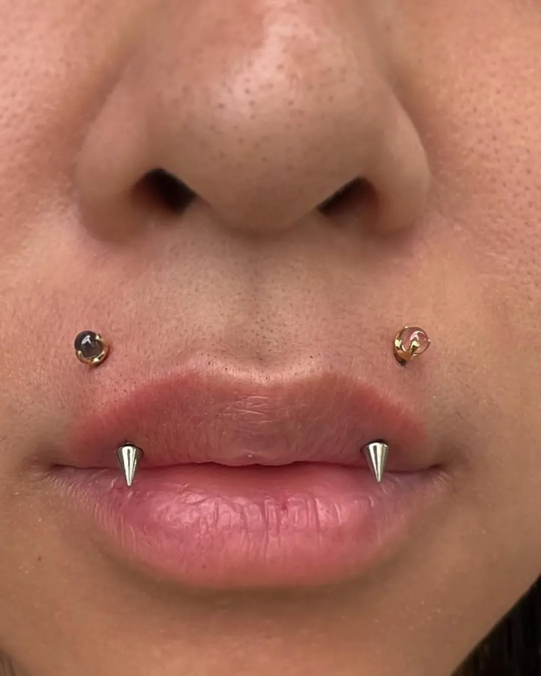 madeline kelso vertical lip piercings