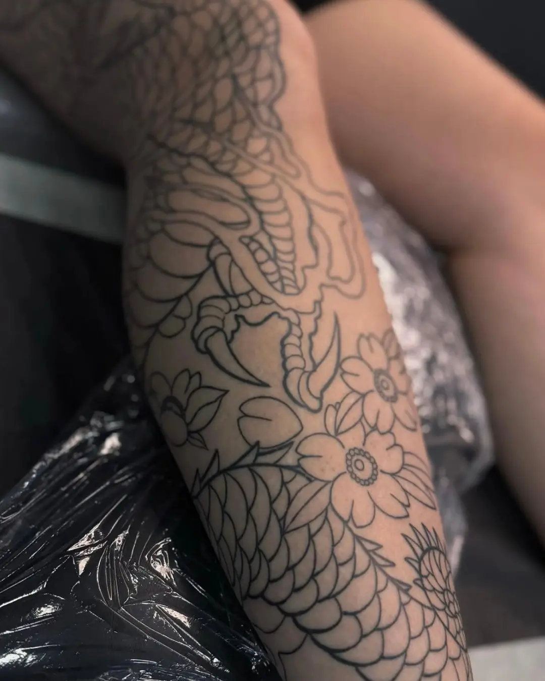 Japanese tattoos Chicago dragon sleeve tattoo embodying power and wisdom