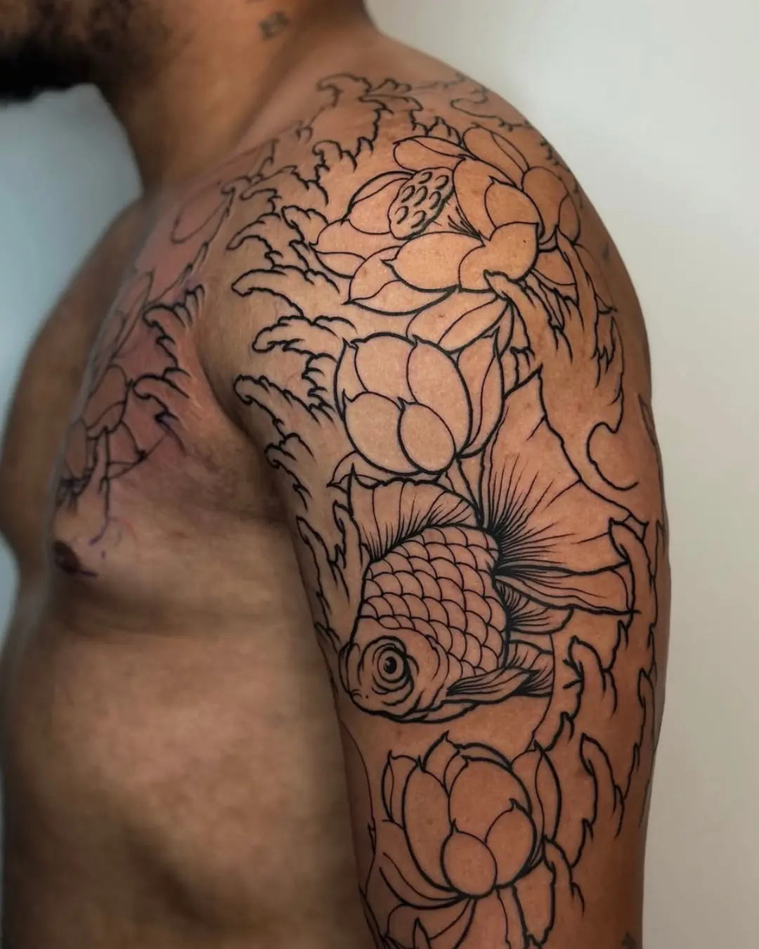 Japanese tattoos Chicago koi fish back piece representing perseverance in Chicago