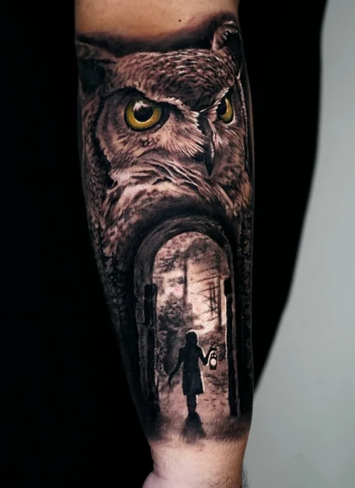 Nelson Aviles black and grey owl tattoo with a mysterious surreal portal