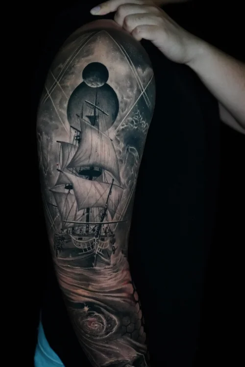 Nelson-Aviles-black-and-grey-tattoo-of-a-fierce-wolf-with-geometric-background