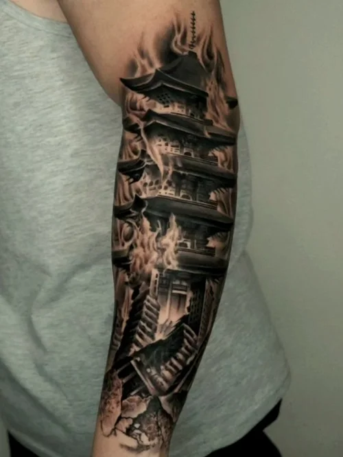 Nelson Aviles black and grey tattoo of burning temples