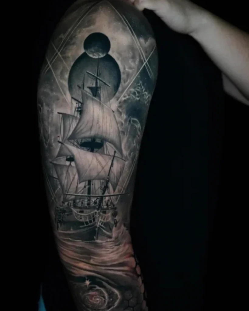Surrealism tattoo featuring a full moon, a ship, and a human face hidden within the sails.