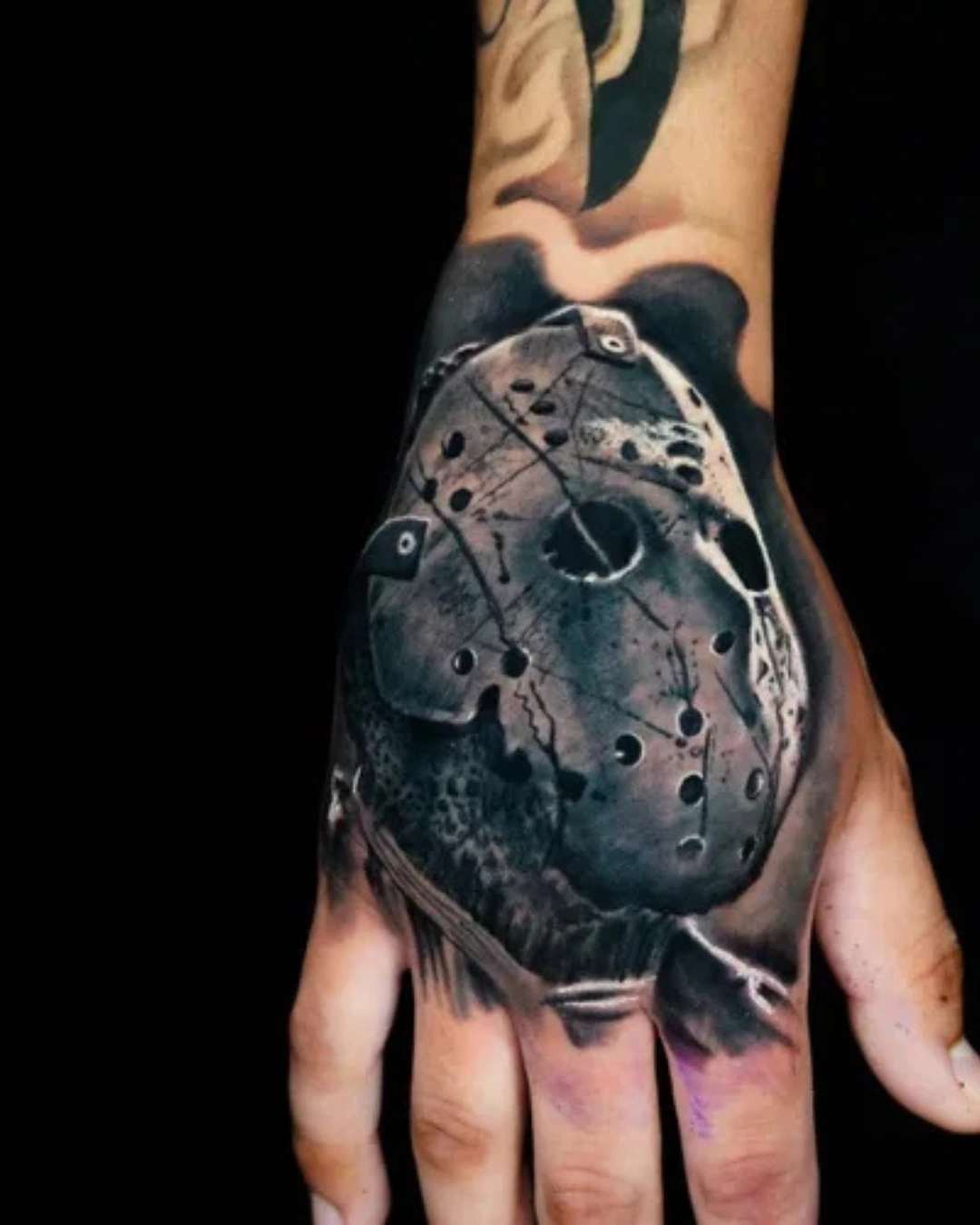 Surrealism-tattoo-of-praying-hands-intersected-by-abstract-lines-and-circular-visual-elements