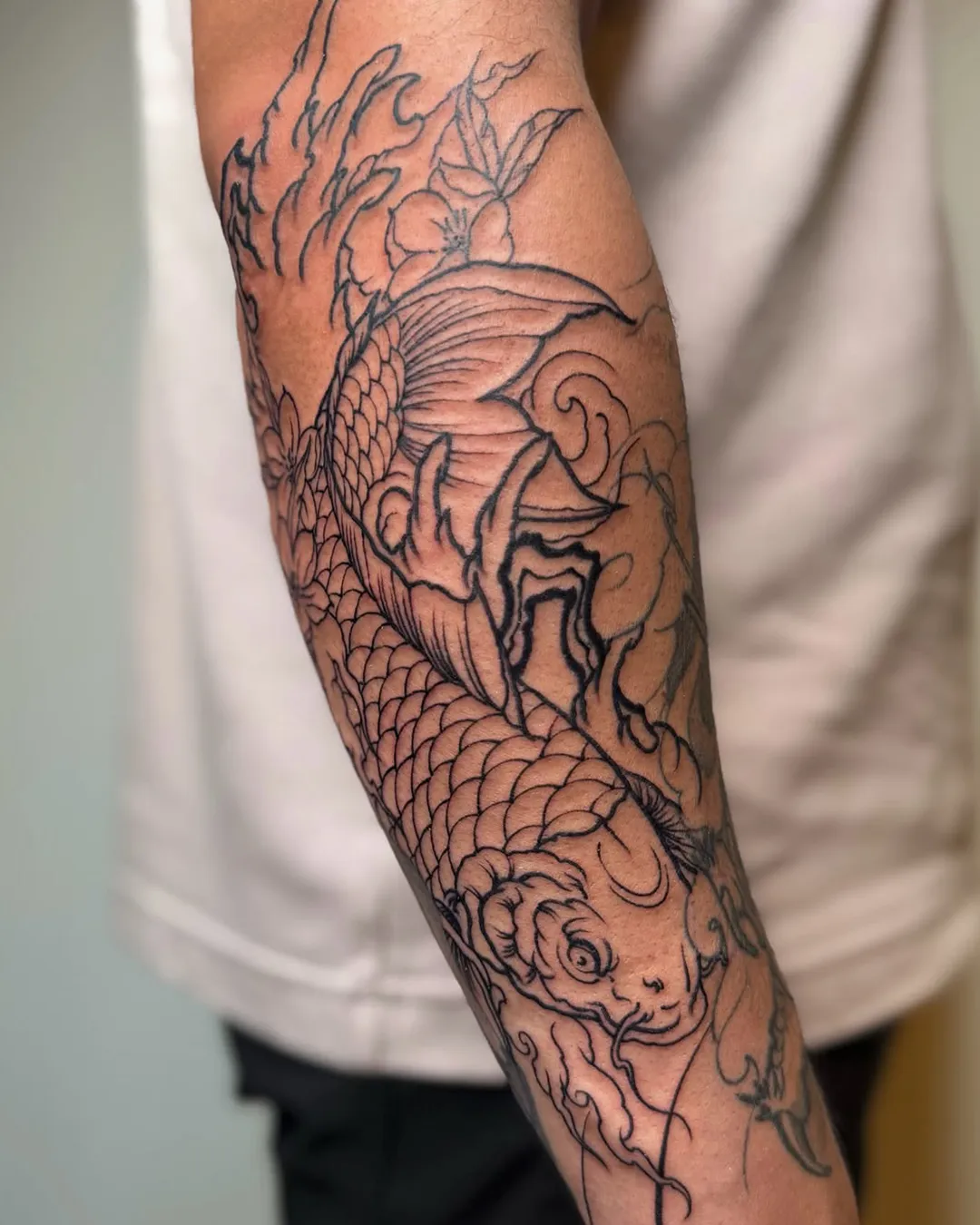 sofiia tattoo artist chicago arm tattoo dragon flowers