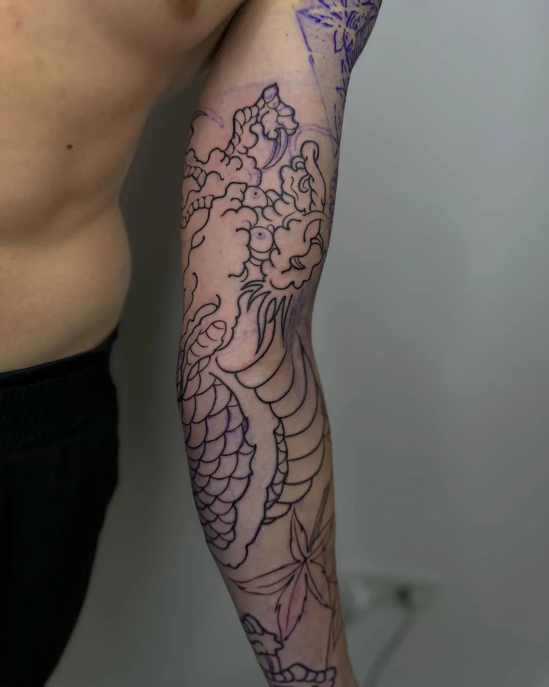 sofiia tattoo artist chicago arm tattoo floral dragon