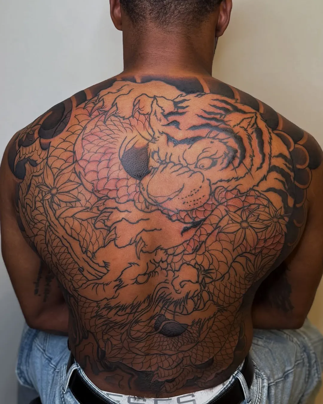 sofiia tattoo artist chicago back tattoo dragon tiger