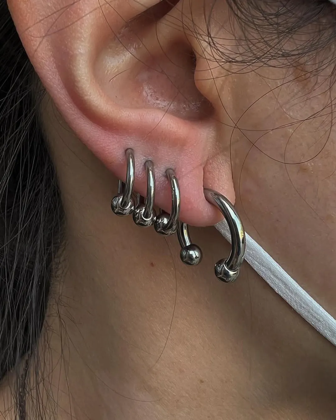 body piercing lobe stacked horseshoe ear piercing chicago